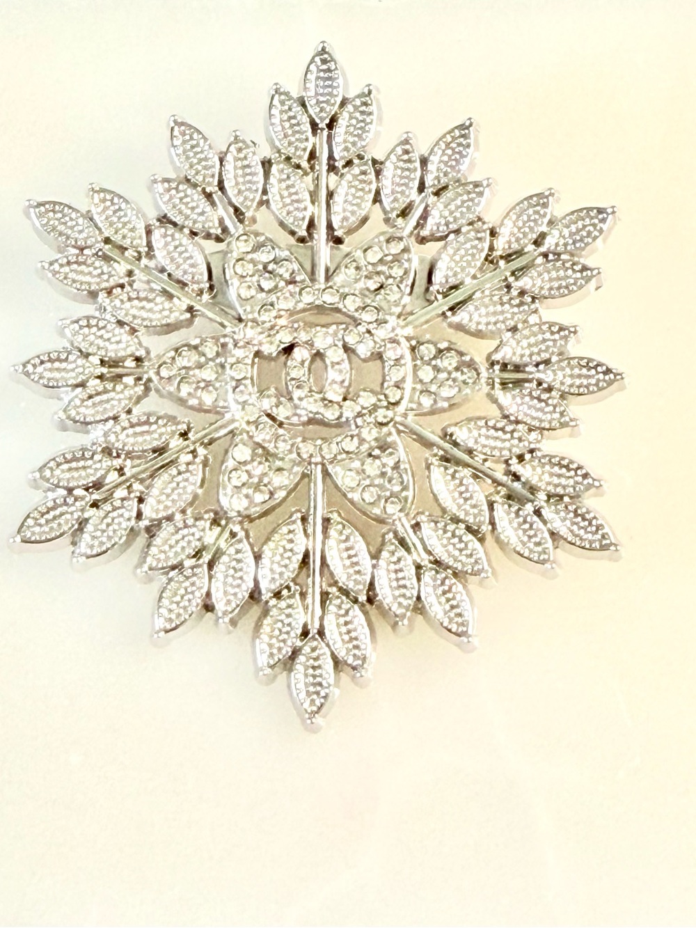 Macy's Silver Floral Crystal Logo Brooch